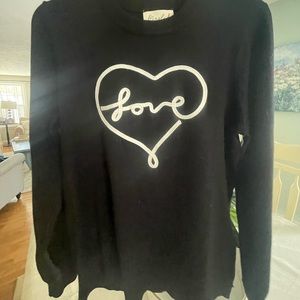 Women’s black and white Valentine sweater. Adorable, and chic.